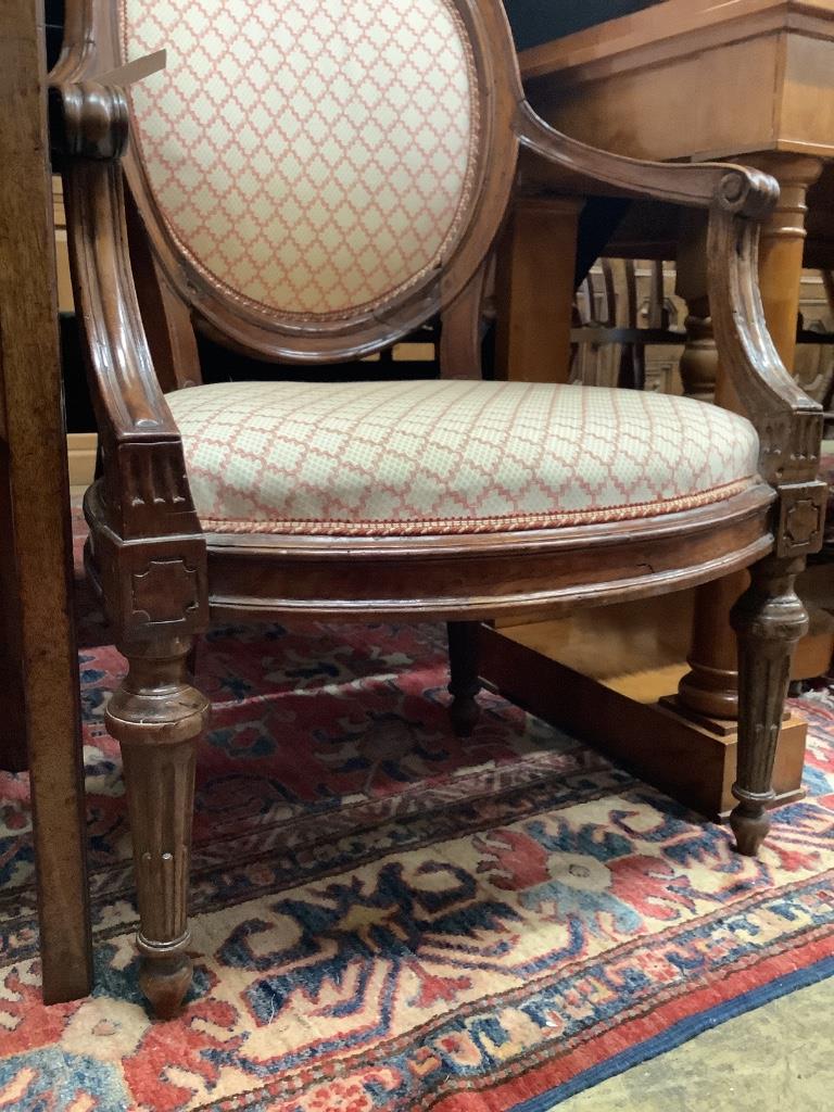 A pair of 19th century French elbow chairs, width 62cm, depth 50cm, height 100cm